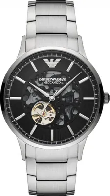 A close-up, front-facing studio shot of an Emporio Armani mechanical watch with a black dial and silver metal band.