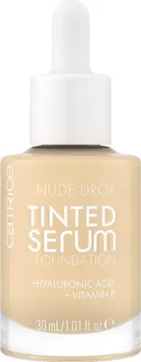 A bottle of Catrice Nude Drop Tinted Serum Foundation.