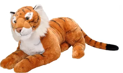 A plush tiger toy lying down.