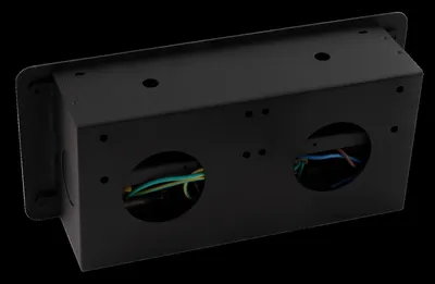 A black metal electrical box with two circular openings showing wires.