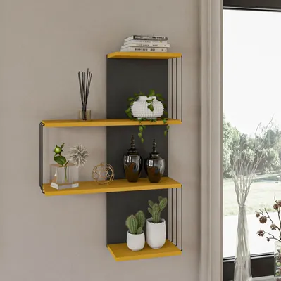 A modern yellow and black wall shelf unit with decorative items.