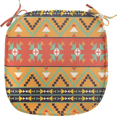 A square seat cushion with a tribal Aztec pattern, shown from a top-down diagonal angle.