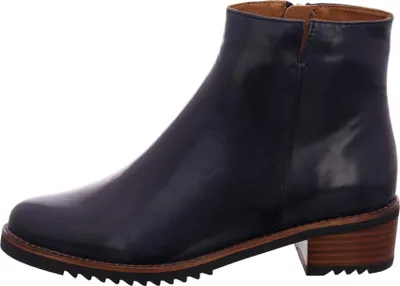 A side view of a single dark blue ankle boot against a white background.