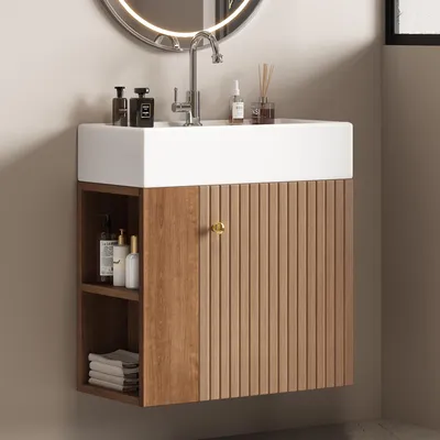 A bathroom vanity with a sink and cabinet.
