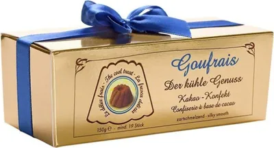 A golden gift box of chocolates tied with a blue ribbon.