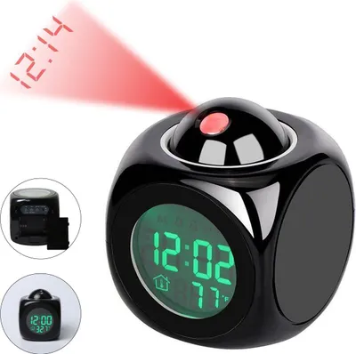 A black cube-shaped digital alarm clock with a projection feature displaying the time on a red beam.