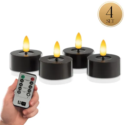 Image de Meisterhome® Lot de 4 bougies chauffe-plat LED XXL - Bougies sans flamme en cire véritable - Ø 7 cm, hauteur 3 cm - Lumière blanche chaude vacillante - Avec minuterie & télécommande - Fonctionne sur piles, Couleur:Noir