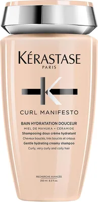 A product shot of a bottle of shampoo.