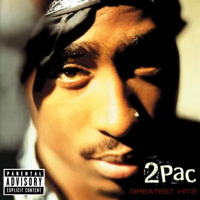 Close-up portrait of Tupac Shakur.