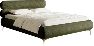 A green upholstered bed with white bedding and gold legs, shown against a white background.