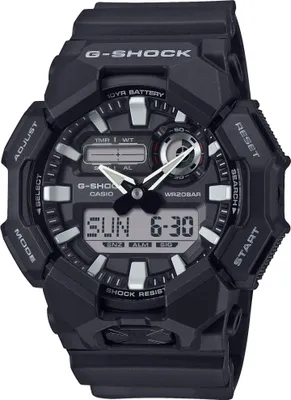 A black G-Shock watch is shown from the front against a black background.