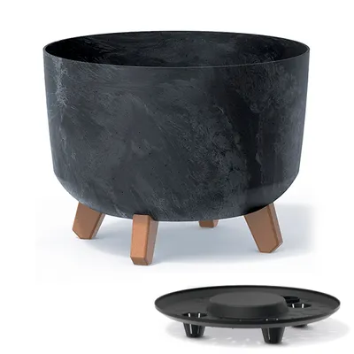 A black planter with a marbled pattern sits on three copper-colored legs, with a separate black saucer shown below.