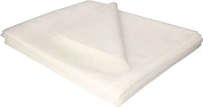 A stack of white fabric sheets.