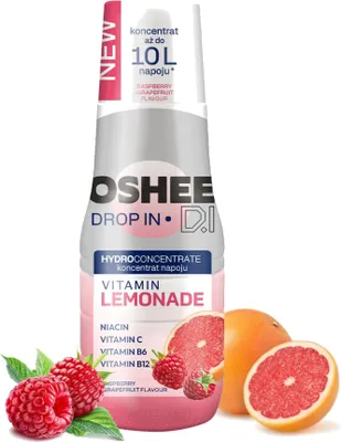A bottle of OSHEE Vitamin Lemonade concentrate with raspberries and grapefruit slices.