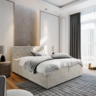 A bedroom scene featuring a bed, nightstand, and curtains.