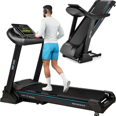 A man is running on a treadmill, with another treadmill shown folded in the background.