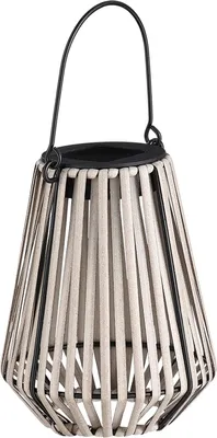 A hanging lantern made of rattan and metal.