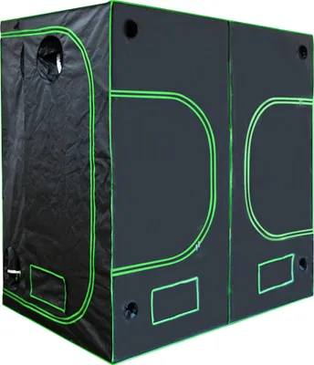 A black grow tent with green trim, divided into two sections.