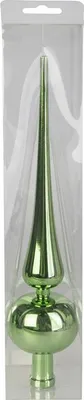 A green tree topper in its packaging.