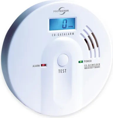 A white carbon monoxide detector with a digital display and test button.