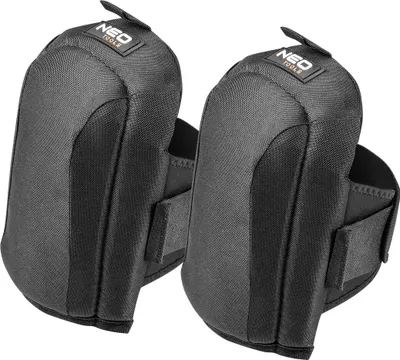A pair of black knee pads on a white background.