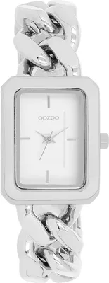 A studio shot of a silver women's watch with a rectangular face and a chunky chain bracelet.