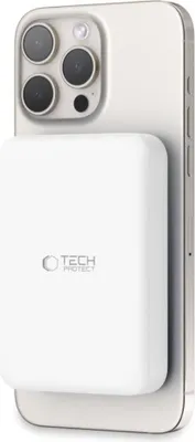 A white power bank is attached to the back of a silver smartphone.