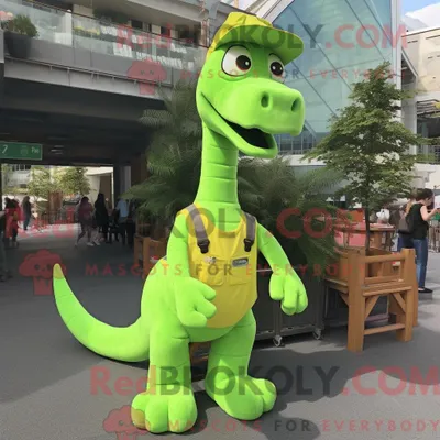 Zdjęcie produktu dla Maskotkarakter REDBROKOLY av en limegrønn Brachiosaurus kledd med en kjeledress og halskjeder