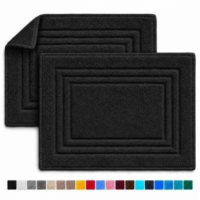 Zdjęcie produktu dla Dwa dywaniki łazienkowe Komfortec wykonane w 100% z bawełny, o gramaturze 600 GSM, idealne pod prysznic