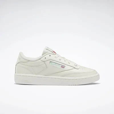 A single white Reebok sneaker is shown against a white background.