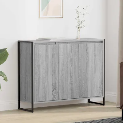 A gray wooden cabinet with black metal legs is shown against a white wall.