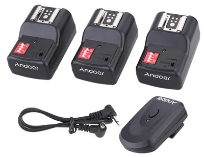 Immagine prodotto di Set di trigger wireless per flash Neewer YOUNGNUO Speedlite a 16 canali: 1 trasmettitore + 3 ricevitori, cavo di sincronizzazione per Canon, Nikon, Pentax, Olympus, Sigma, Sunpak e Vivitar