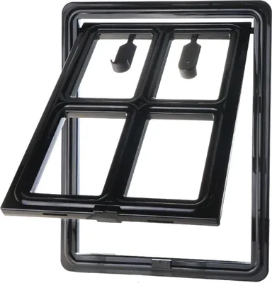 A black pet door flap is shown against a white background.