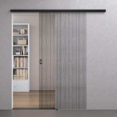 A modern interior scene featuring a sliding glass door and a bookshelf.