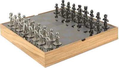 A chess set with metallic pieces on a wooden board.
