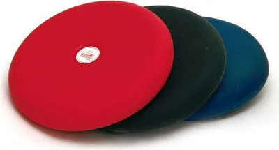 Three round cushions are stacked on a white background.