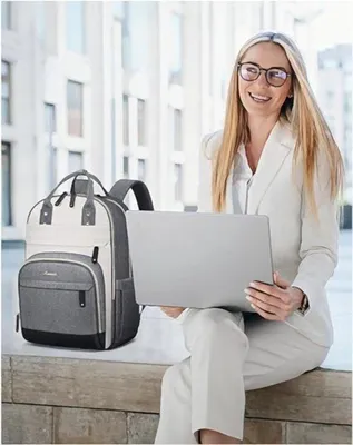 Productafbeelding van Famanu rugzak voor dames - Laptoprugzak, geschikt voor laptops tot 15,6 inch, waterdicht, met diefstalbescherming