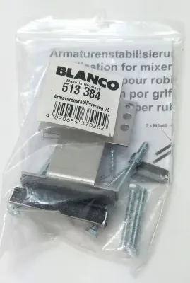 A clear plastic bag containing a plumbing fixture mounting kit, with a label and various metal and rubber components visible.