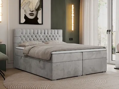 A bedroom scene with a bed as the main focus.