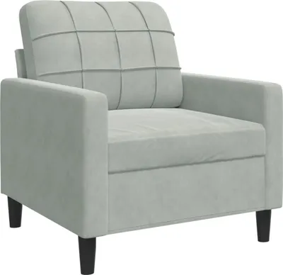 A light gray velvet armchair is shown from a front-side angle against a white background.
