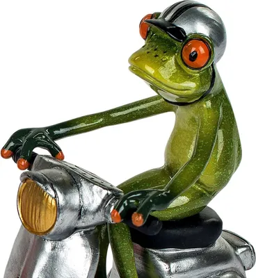 A figurine of a frog wearing a helmet and riding a scooter.