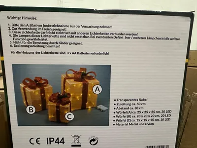 The image shows the packaging of LED gift boxes, with important usage instructions and product specifications listed.