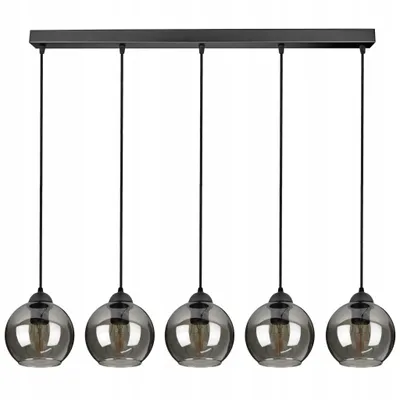 A black linear chandelier with five smoked glass globe shades.