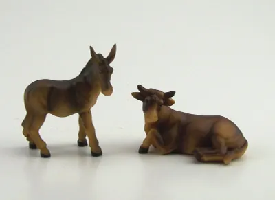 Produktbild von Esel und Ochs aus Polyresin, Krippenfiguren. Esel 6,5x6cm, Ochse 4x6,5 cm.
