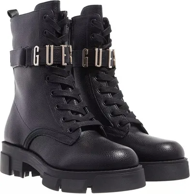 A pair of black Guess boots.