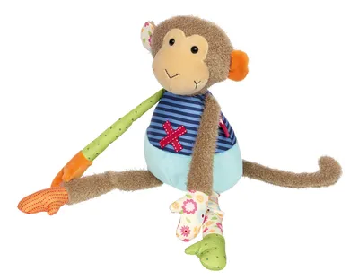 A stuffed monkey toy with colorful patchwork details.