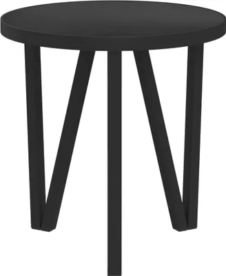 A black round side table with three angled legs against a white background.