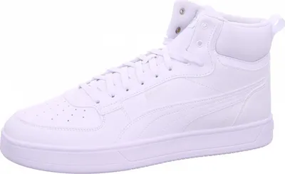 A white Puma sneaker is shown against a white background.