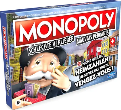 The image shows the front of a Monopoly board game box, featuring the game's mascot and title.