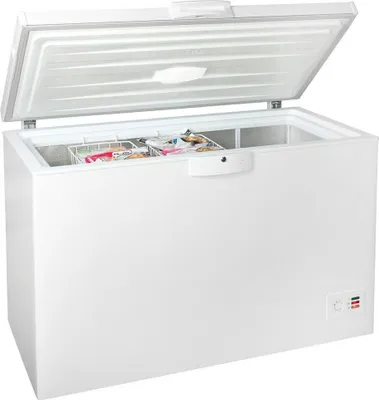 A white chest freezer with its lid open, showing two wire baskets inside filled with frozen food.